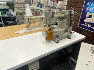 Pegasus w 600 cover stitch automatic sewing machines with table 110 volts .5 Thread Coverstitch Oil Barrier Cylinder Bed Industrial Interlock - Image 3